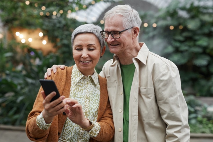 Senior couple checking RPM readings on phone